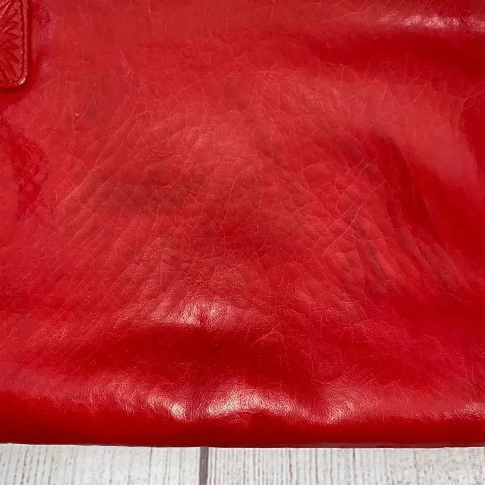 Clutch purse with wrist strap, zipper closure red